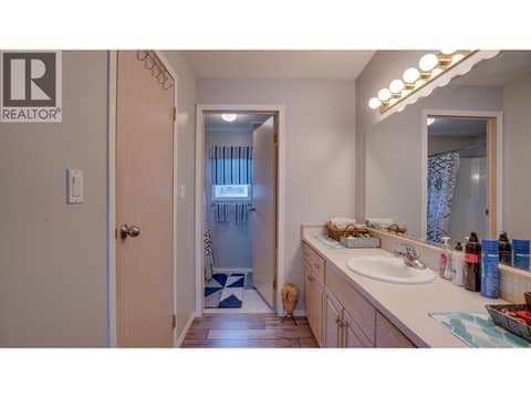 Ensuite 4-piece bathroom. Walk-in closet there on the left side! at 9510 Highway 97N Unit# 43, Swan Lake West, Vernon
