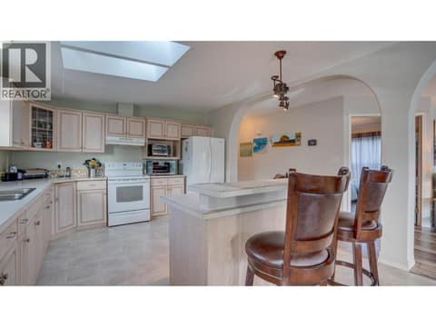The space available in this kitchen is huge! at 9510 Highway 97N Unit# 43, Swan Lake West, Vernon