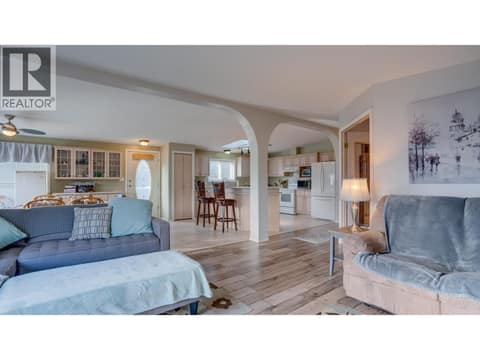 View from Living Room to the Kitchen. at 9510 Highway 97N Unit# 43, Swan Lake West, Vernon