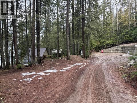 Coming into the property, the road is an easement allowing access through the property to the neighbours. at 8700 Mabel Lake Road, Mabel Lake South, Lumby