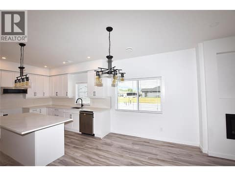 Dining space beside the kitchen at 592 Nighthawk Avenue, Okanagan North, Vernon