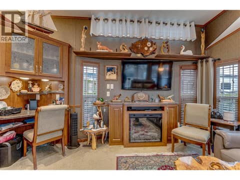 Electric fireplace, built in desk at 8000 Highland Road Unit# 42, North BX, Vernon
