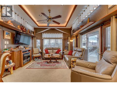 Large living room with high ceilings at 8000 Highland Road Unit# 42, North BX, Vernon