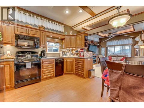 Lots of cabinets in your functional kitchen at 8000 Highland Road Unit# 42, North BX, Vernon