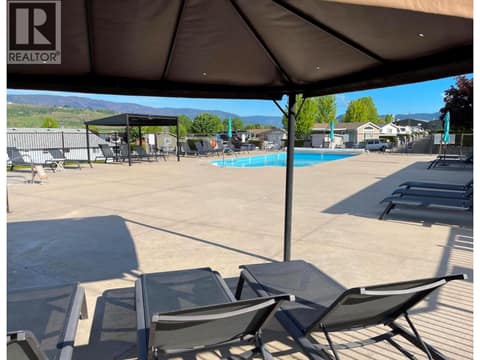 Shade by the pool at 8000 Highland Road Unit# 42, North BX, Vernon
