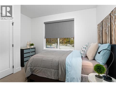 Bedroom Main Level at 209 Ashcroft Place, Predator Ridge, Vernon