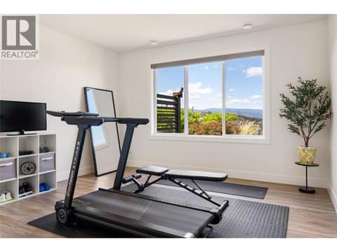 Bedroom / Work Out Room Lower Level at 209 Ashcroft Place, Predator Ridge, Vernon
