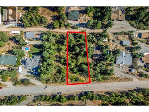 .356-acre  lot with access from Westshore Rd. at top of the lot and service road at bottom. at 10523 Westshore Road, Okanagan North, Vernon