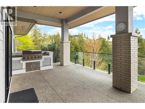 Built-In BBQ at 689 Birdie Lake Place, Predator Ridge, Vernon