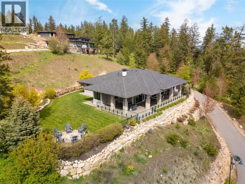 Large Level, Fully Landscaped Yard at 689 Birdie Lake Place, Predator Ridge, Vernon
