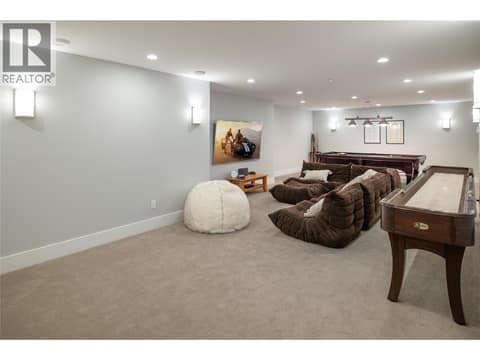 Lower Level Games and Entertainment Room at 689 Birdie Lake Place, Predator Ridge, Vernon