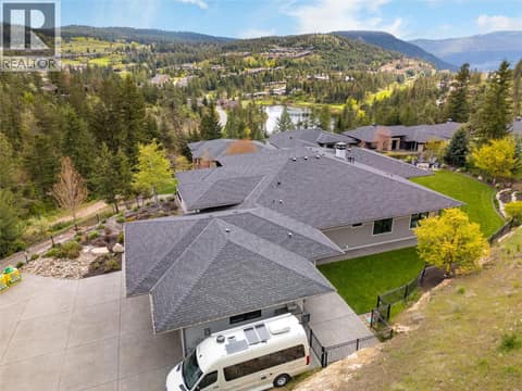 RV Parking on Side of Home at 689 Birdie Lake Place, Predator Ridge, Vernon