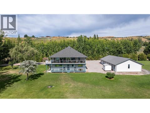 Back of Home facing the lake at 7821 Old Kamloops Road, Swan Lake West, Vernon