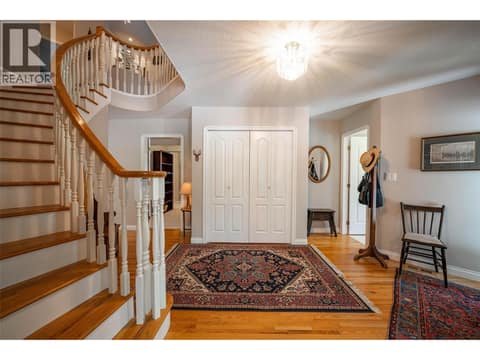 Lower Level Floor: Grand Front Entrance at 7821 Old Kamloops Road, Swan Lake West, Vernon
