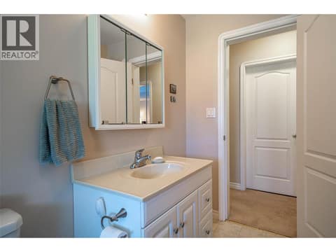 Lower Level Floor:  3PC Bathroom at 7821 Old Kamloops Road, Swan Lake West, Vernon