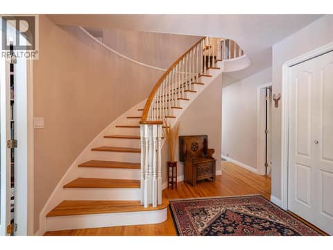 Stunning Staircase to Upper level at 7821 Old Kamloops Road, Swan Lake West, Vernon