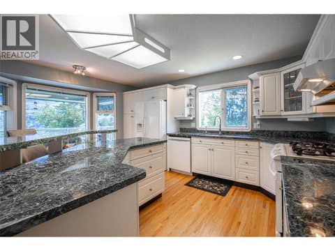 Upper Main Level:  Open Plan Kitchen at 7821 Old Kamloops Road, Swan Lake West, Vernon