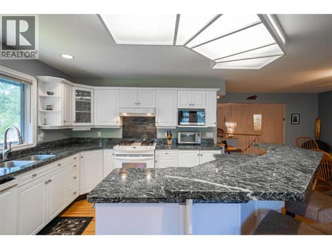 Upper Main Level:  Open Plan Kitchen at 7821 Old Kamloops Road, Swan Lake West, Vernon