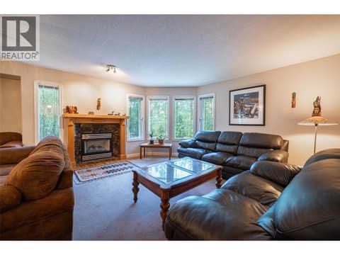 Upper Main Level:  Living Room at 7821 Old Kamloops Road, Swan Lake West, Vernon