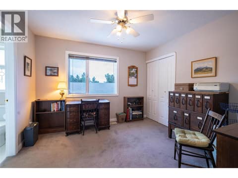 Upper Main Level: #4 Bedroom with 4PC Cheater Bathroom at 7821 Old Kamloops Road, Swan Lake West, Vernon