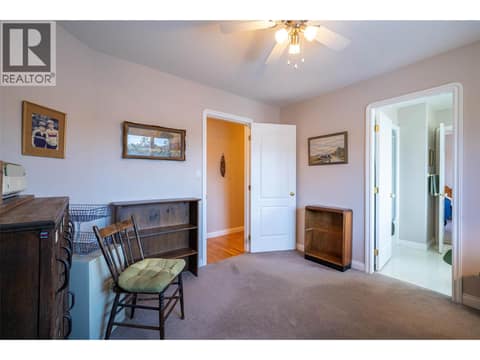 Upper Main Level: #4 Bedroom with 4PC Cheater Bathroom at 7821 Old Kamloops Road, Swan Lake West, Vernon