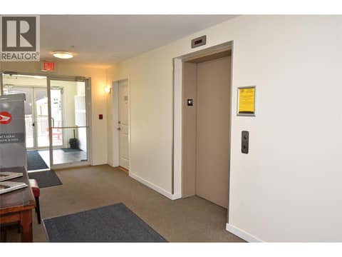 Main entrance and elevator access at 4205 27 Street Unit# 102, City of Vernon