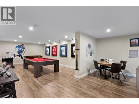 Games and family room open and adjacent to each other at 229 Holloway Drive, Tobiano, Kamloops
