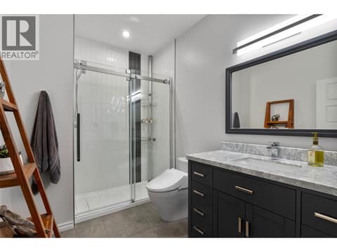 Lower level three piece bathroom at 229 Holloway Drive, Tobiano, Kamloops