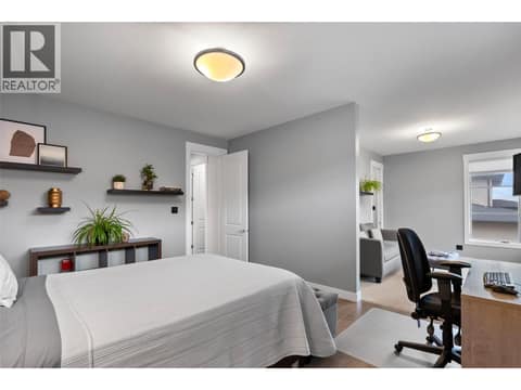 Second main level bedroom at 229 Holloway Drive, Tobiano, Kamloops