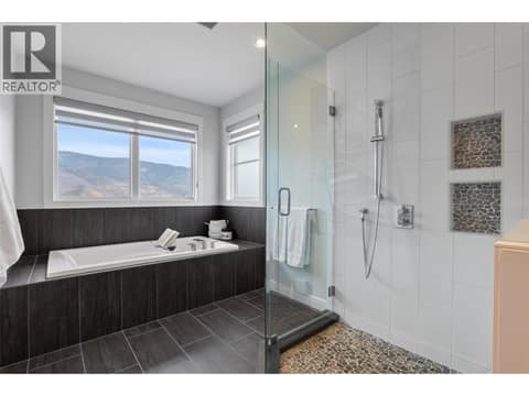 Separate glass shower and soaker tub at 229 Holloway Drive, Tobiano, Kamloops