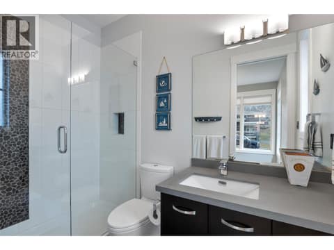 Three piece ensuite off of the sitting area at 229 Holloway Drive, Tobiano, Kamloops