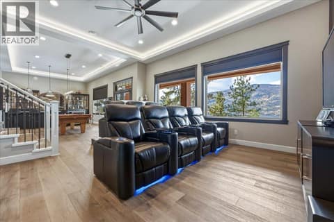 Theatre room with automated blackout blinds at 2328 Arthur Court, McKinley Landing, Kelowna
