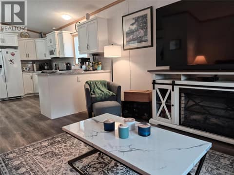 Living room to kitchen at 5484 Okanagan Landing Road Unit# 51, Okanagan Landing, Vernon