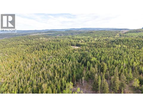 Stunning View over the Rock Quarry, with home in the distance at 650 Bluenose Road, Lavington, Vernon