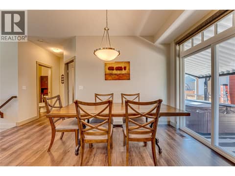Dining with sliders to the covered patio at 270 Grouse Avenue, Okanagan North, Vernon