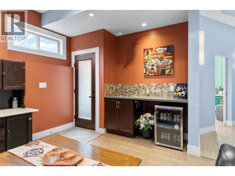 Sitting area with wet bar down at 529 Whitecourt Place, Foothills, Vernon