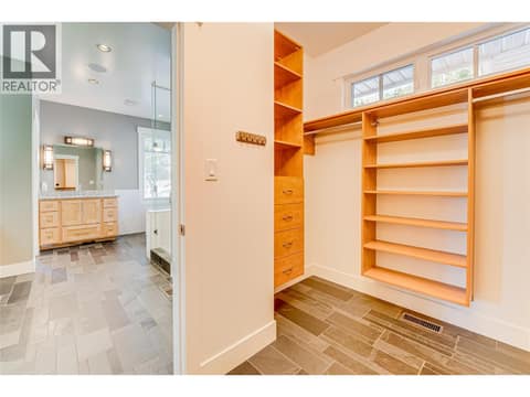 Large walk in closet at 6054 Lynx Drive, North BX, Vernon