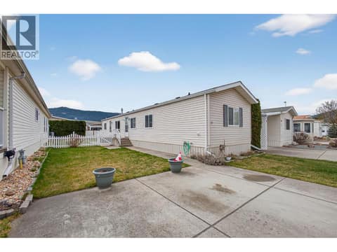 Front of Home & Driveway with Room for 2 Vehicles at 6688 Tronson Road Unit# 29, Okanagan Landing, Vernon