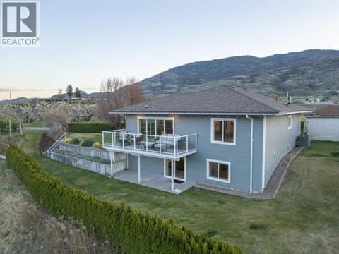 Main residence back view at 14807 89th Street, Osoyoos Rural