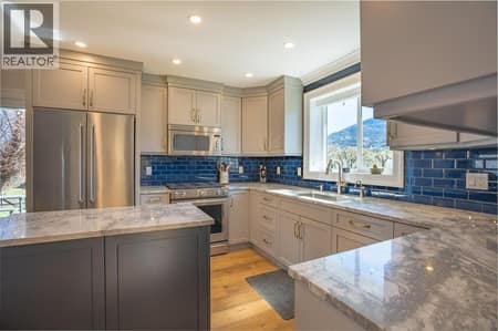 Main residence kitchen at 14807 89th Street, Osoyoos Rural