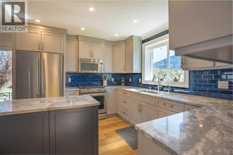 Main residence kitchen at 14807 89th Street, Osoyoos Rural