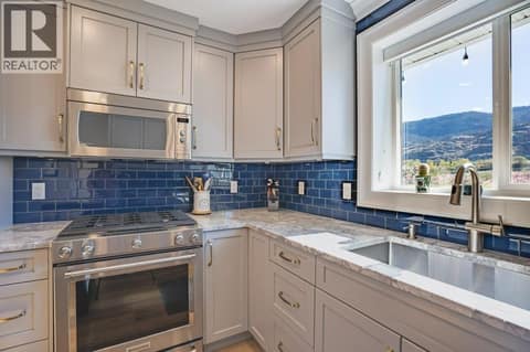 Main residence kitchen at 14807 89th Street, Osoyoos Rural