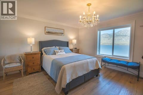 Main residence primary bedroom at 14807 89th Street, Osoyoos Rural