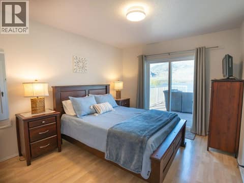 Second residence primary bedroom at 14807 89th Street, Osoyoos Rural