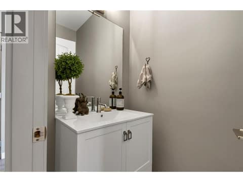 Main Floor Powder Room at 595 Vineyard Way N Unit# 31, Bella Vista, Vernon