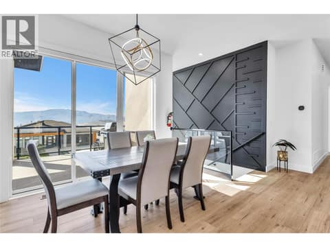 Dining Room with entry on partially covered deck at 2842 Copper Ridge Drive, Smith Creek, West Kelowna