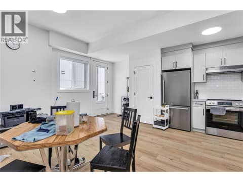 Legal Suite Living/ Dining/ Kitchen and Entrance at 2842 Copper Ridge Drive, Smith Creek, West Kelowna