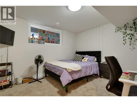 Bedroom downstairs at 1999 15 Avenue Unit# 9, East Hill, Vernon