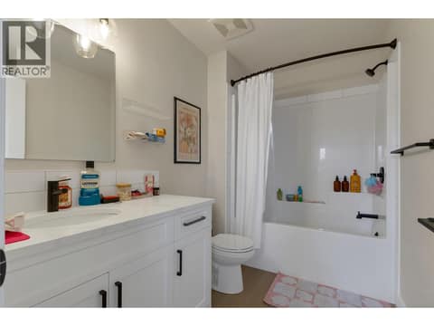 Full bathroom upstairs at 1999 15 Avenue Unit# 9, East Hill, Vernon