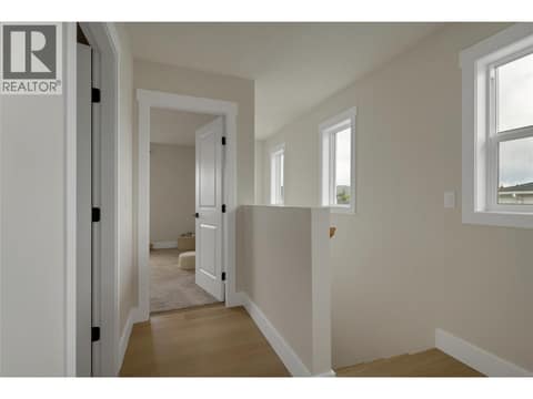 Large landing area to 2 beds and a bath. at 1999 15 Avenue Unit# 9, East Hill, Vernon